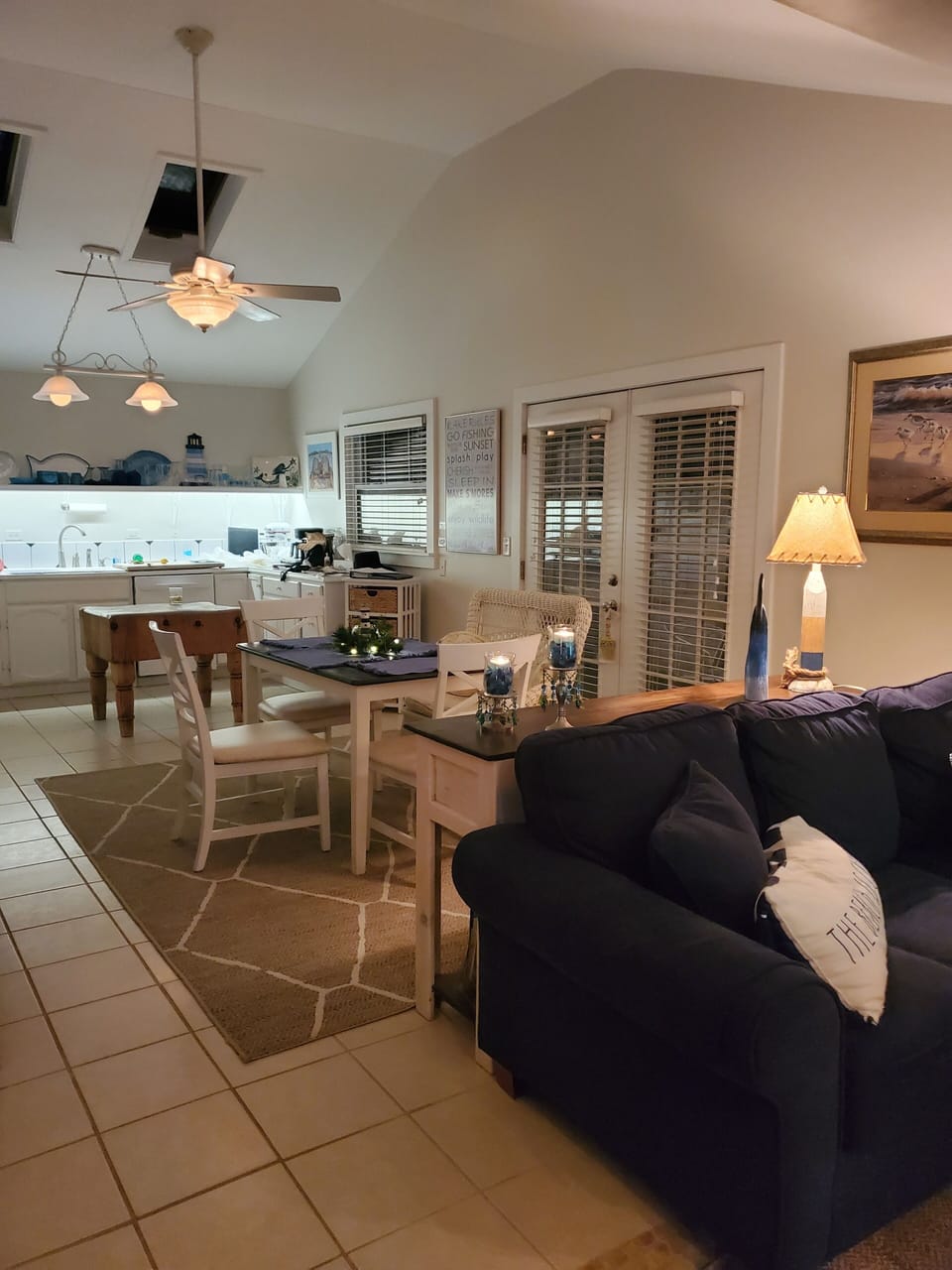 Kitchen and dining area with cathedral ceiling, perfect for inside family dining