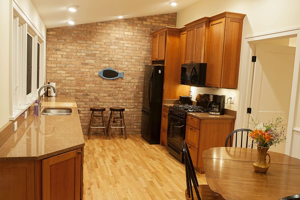 Kitchen is bright and updated .  All windows face the lake. 