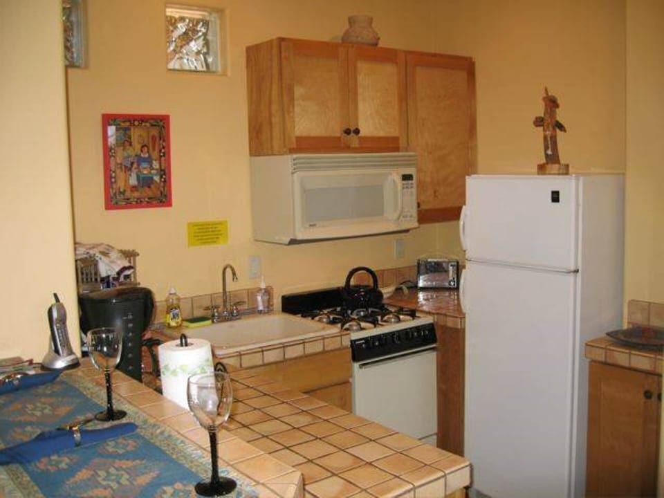 Kitchen With Dishwasher, Stove, Refrigerator And All Appliances