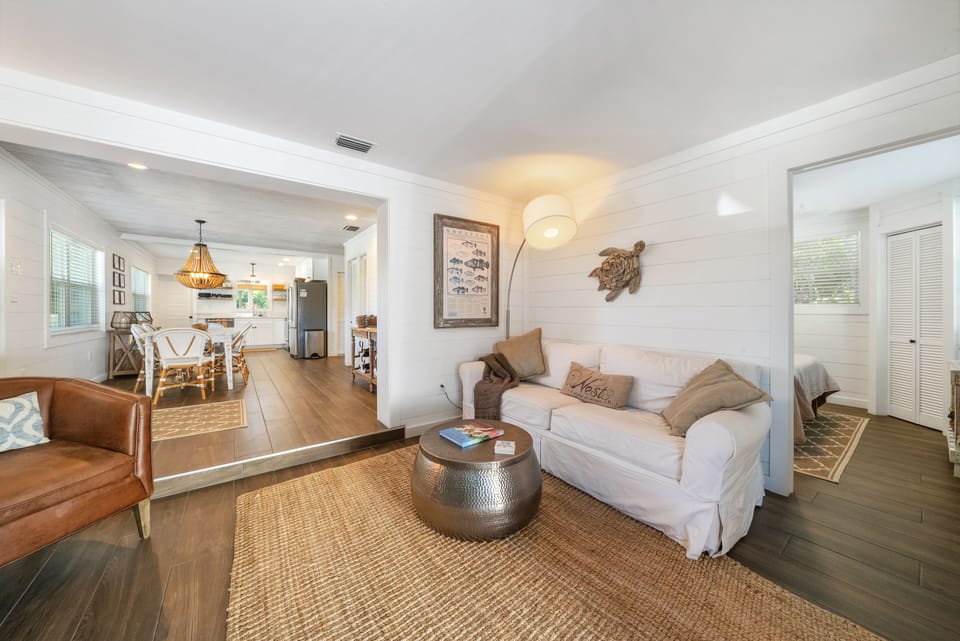 Comfortable living area with costal inspired furnishings.