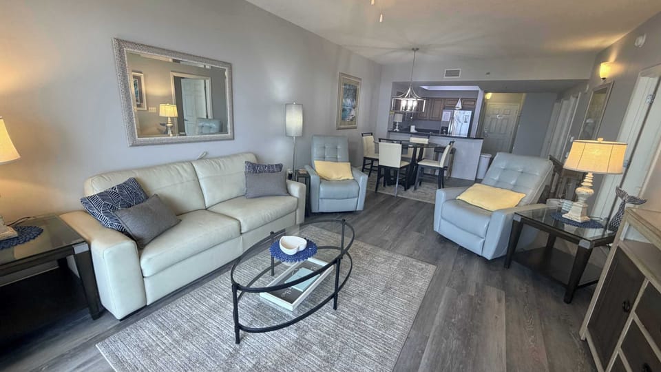Living room with sleeper sofa and recliners