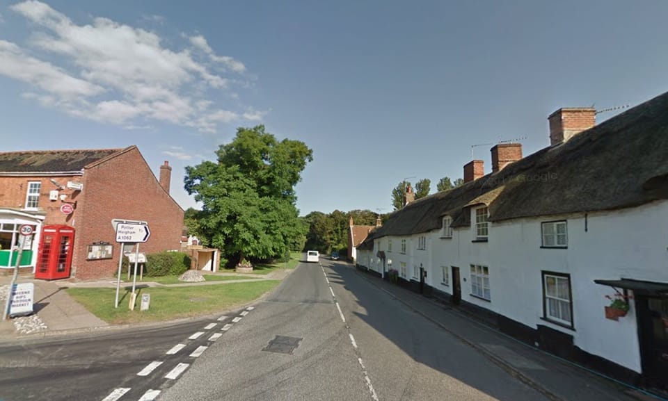 Looking down Yarmouth Road towards Potter Heigham - Bakers Cottage on the right.