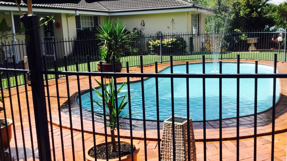 Solar heated swimming pool to use in the warmer months