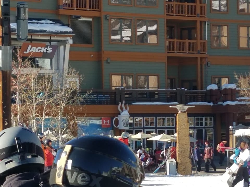 I am In the eagle lift line.The windows above the coffee cup is the condo.