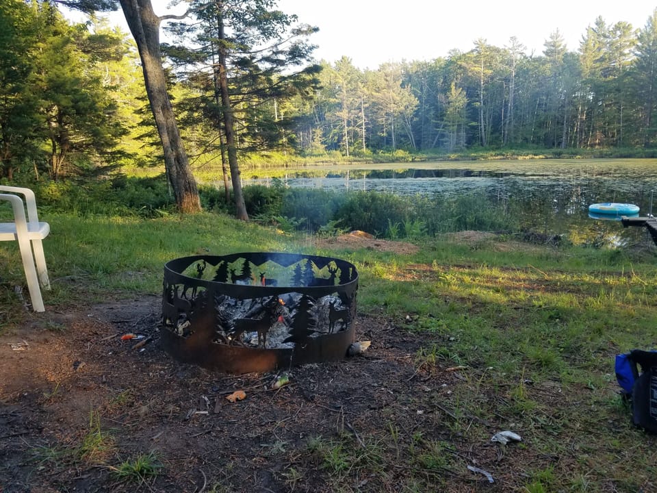 Perfect set up for campfire and roasting dogs and marshmallows over!