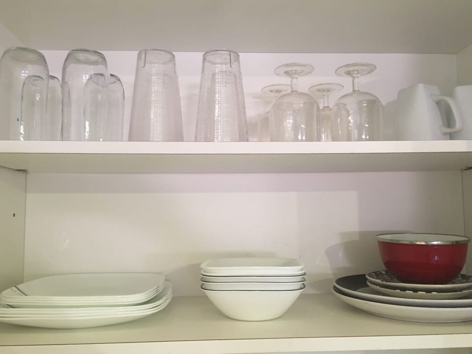 Plenty of glasses, mugs, bowls and plates.