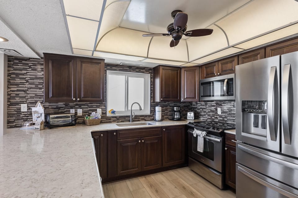 Open Kitchen - Spacious, fully equipped electric kitchen stocked with everything you need to prepare your favorite meals