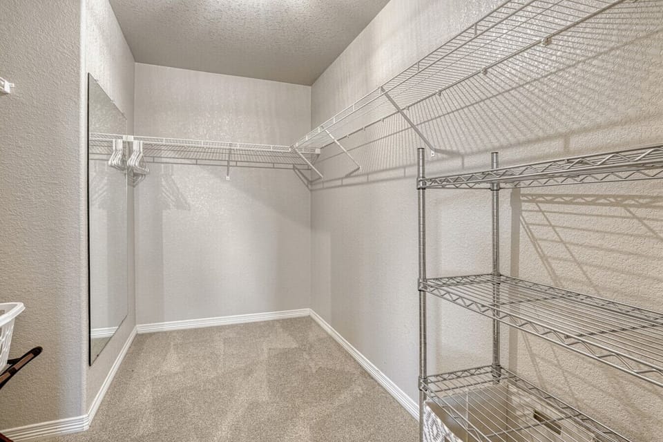 Upper level master bath with walk-in closet