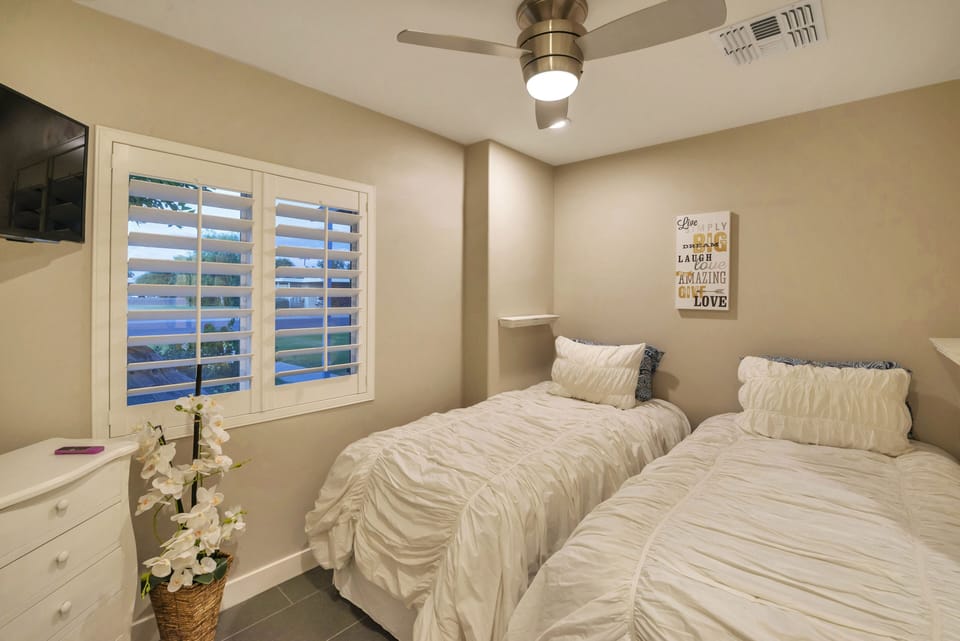 Guest Bedroom #2 - two cozy twin beds that may be pushed together, if desired.