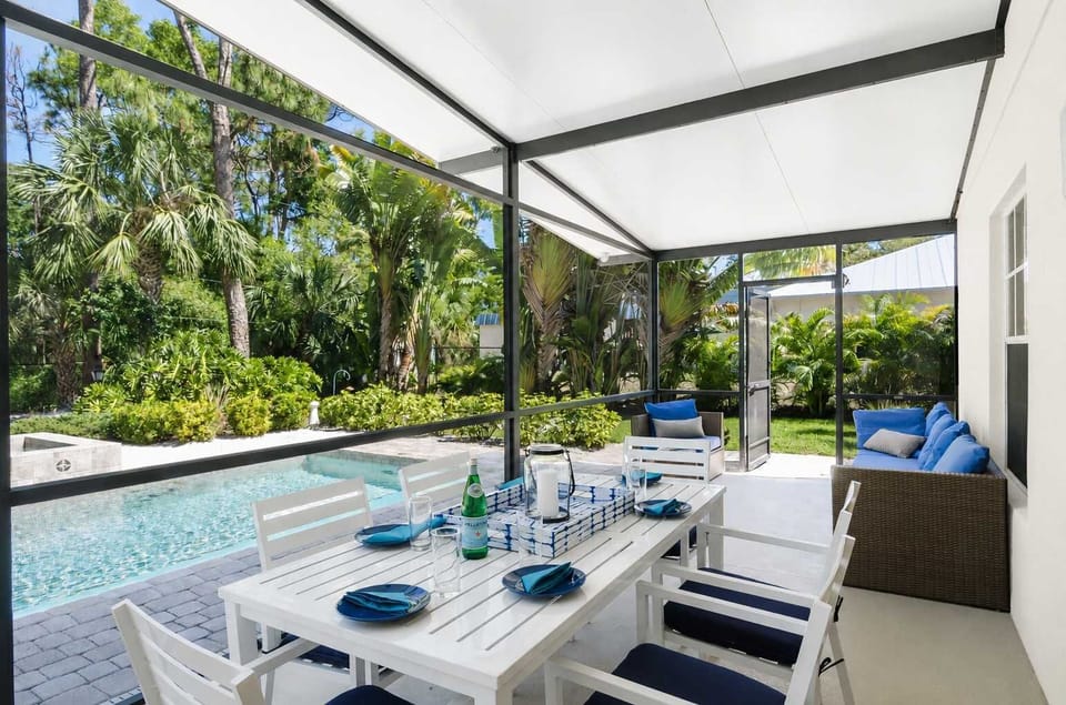 With a large covered patio area perfect for dining outdoors on the seating for 10 or perhaps just a sipping a drink on the outdoor furniture and taking in the beautiful resort like backyard