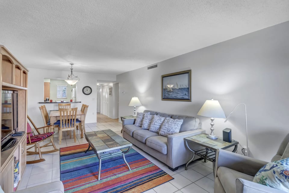 You can see the ocean from the sofa bed and the recliner. Uncluttered.