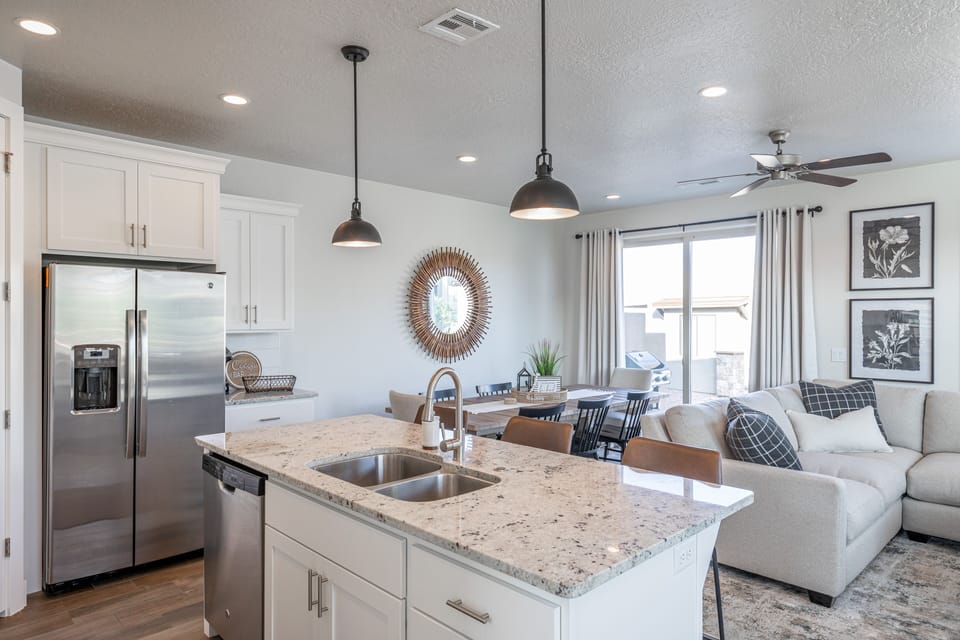Kitchen Island View - With an open and spacious floor plan, the Dining Room and Kitchen can accommodate meal preparations for groups large or small.