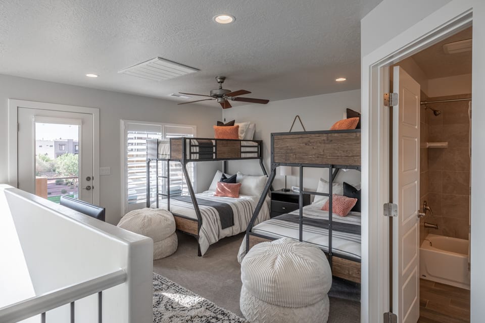 Upstairs Loft - The upstairs loft has two twin over full beds with access to the front patio area.