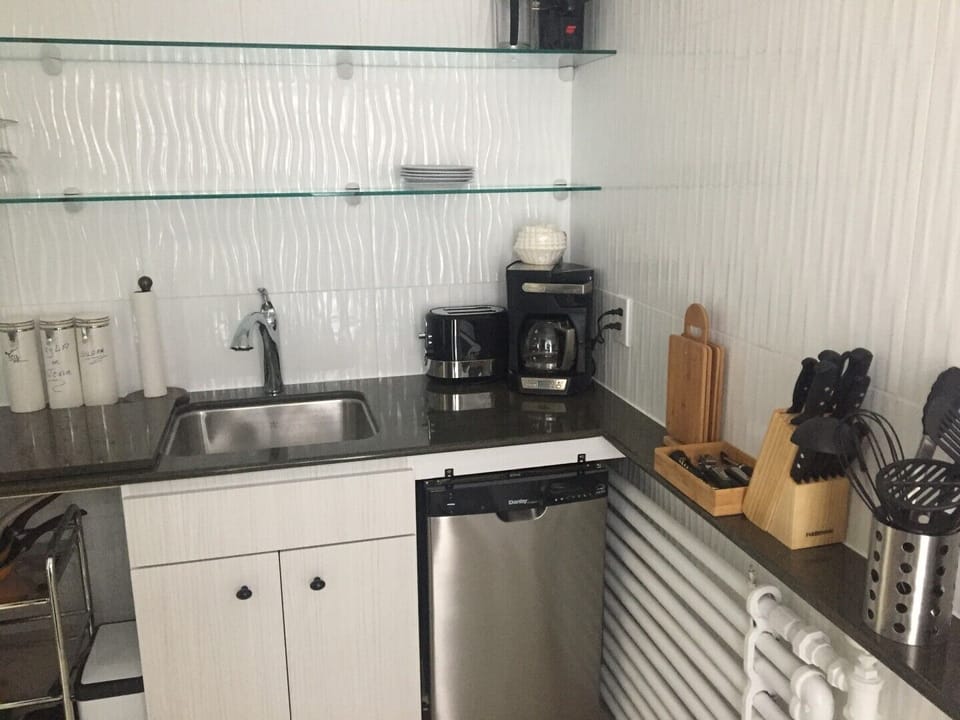Kitchen, small however has all modern conviences