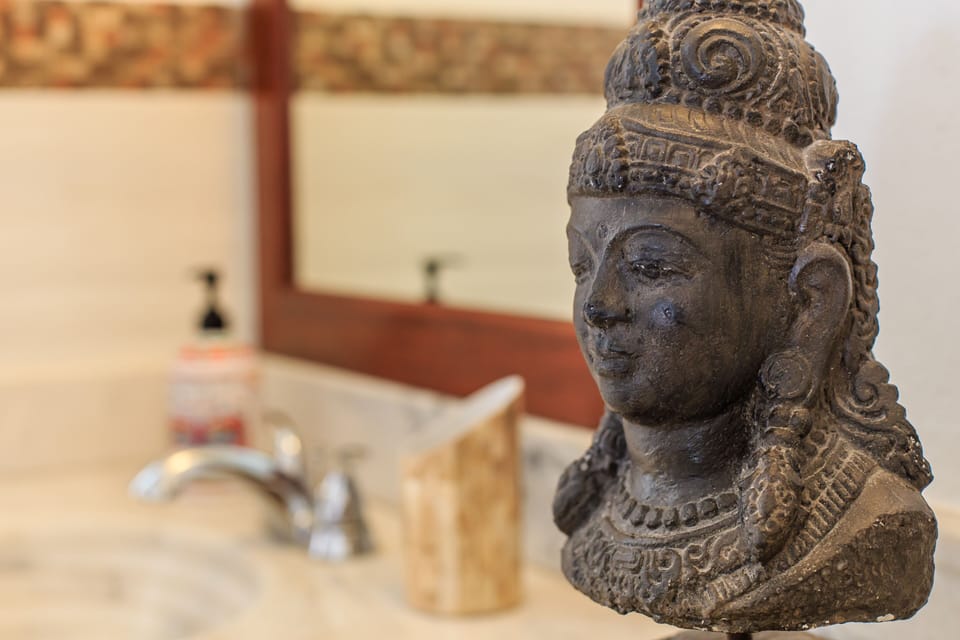 Belizean queen suite  bathroom, each suite has an individual bathroom.