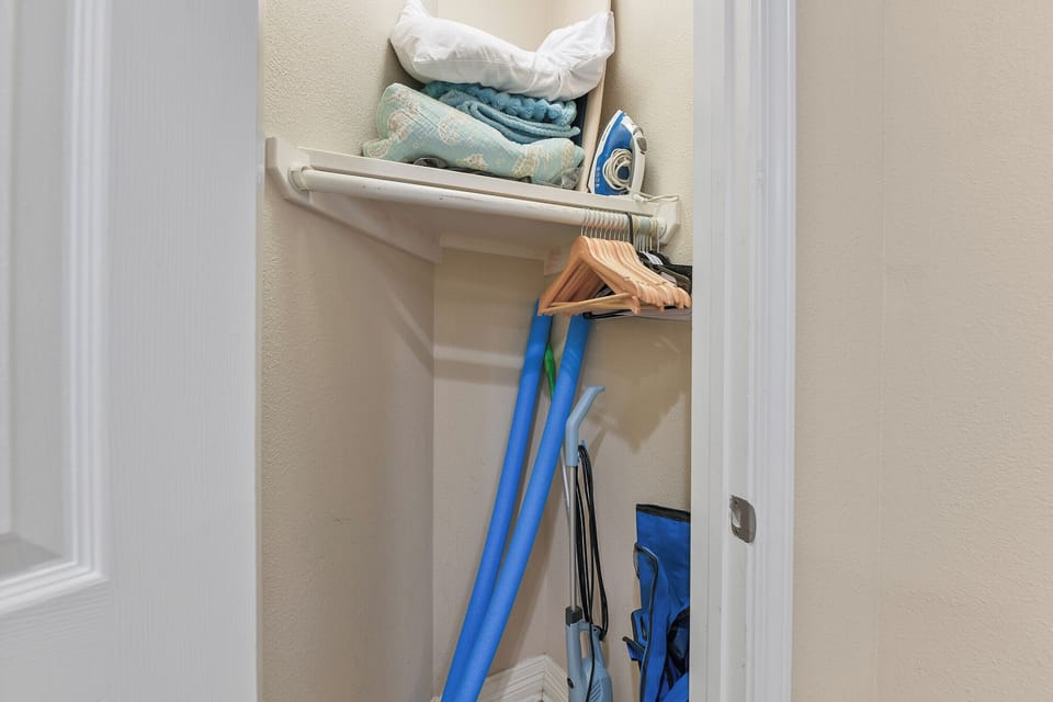 Extra blankets iron & board in the bedroom closet.