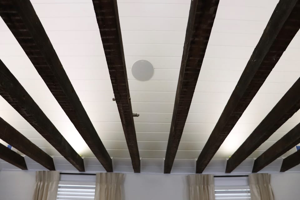 cathedral ceiling with original beams 