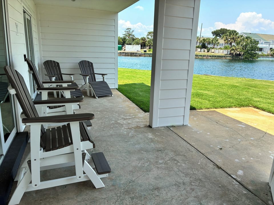 Back Patio - Lounge out back and take in the lake and local wildlife