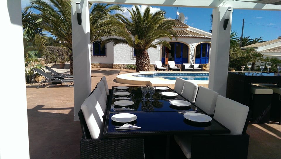 Shaded Poolside Dining Area