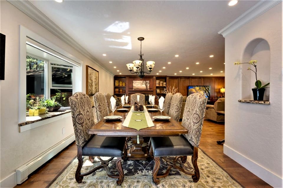 Large Dinning Table Seating for 12 People Addition Chair in the Garage.