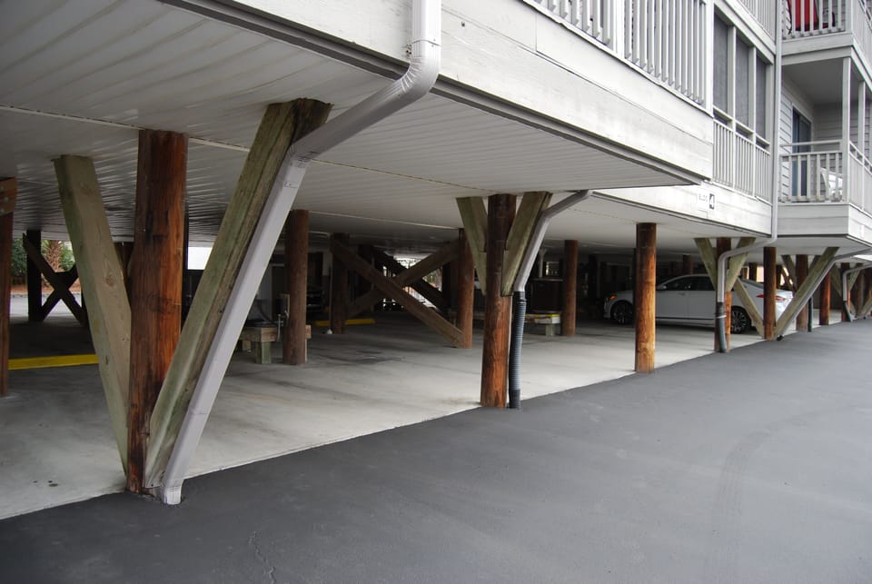 Covered parking just steps away from the elevator