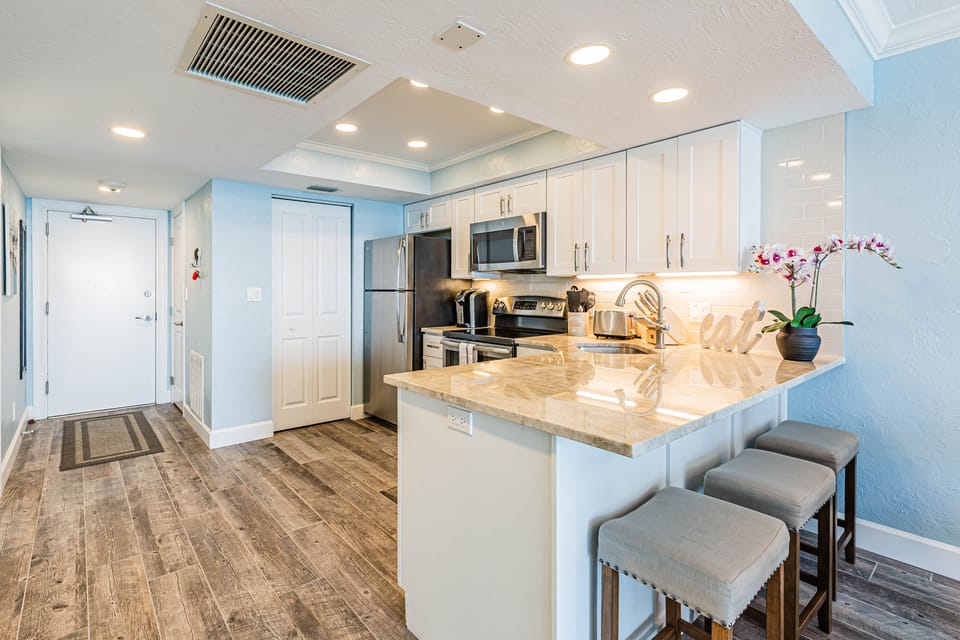 Beachfront Sea Winds 10th Floor remodeled condo. Extra seating at dining bar