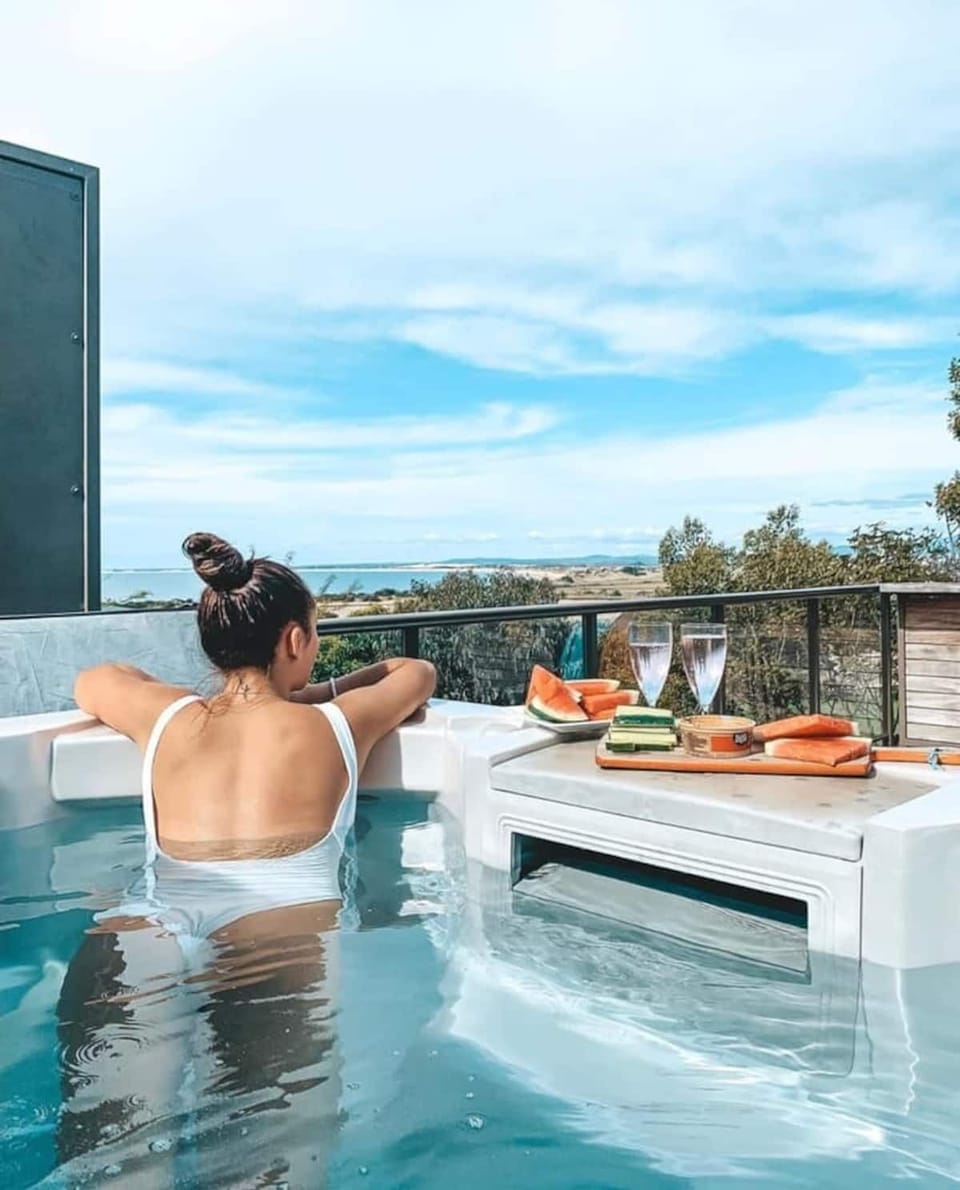 Outdoor heated spa with a view