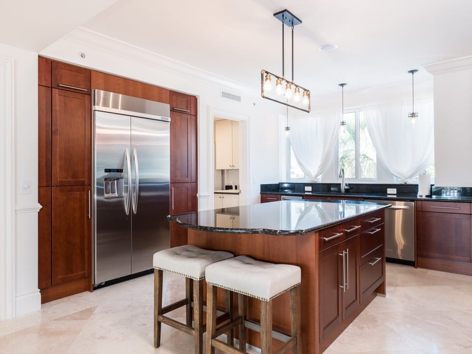 Residence #3822 - Spacious Kitchen with Center Island and Adjoining Laundry Room
