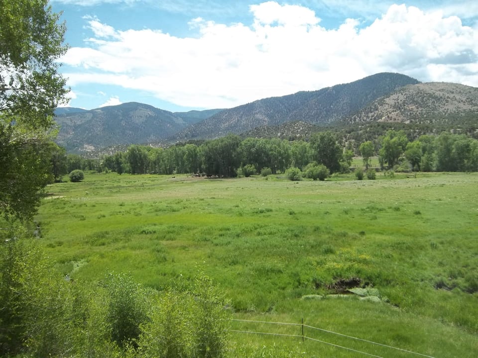 Another view of river bottom looking south east at Cleveland mtn and Poncha mtn.