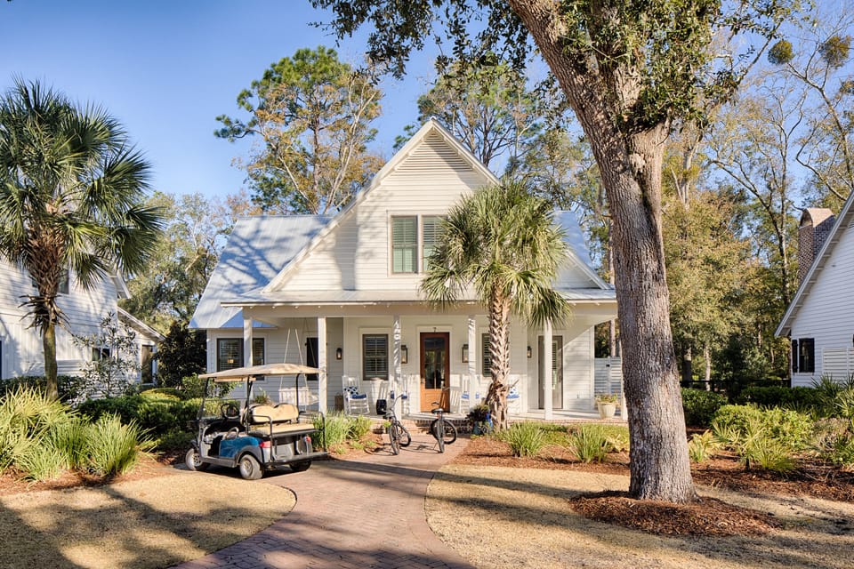 Front of the cottage has a golf cart that the owner allows renters to use.