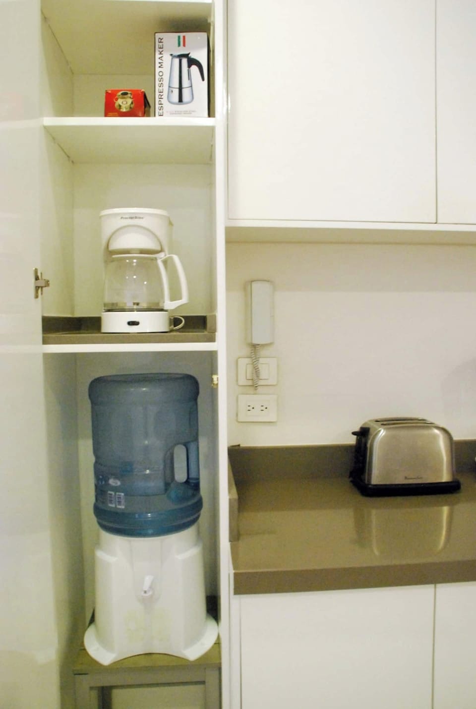 Water and coffee and espresso maker.  One water included upon arrival.