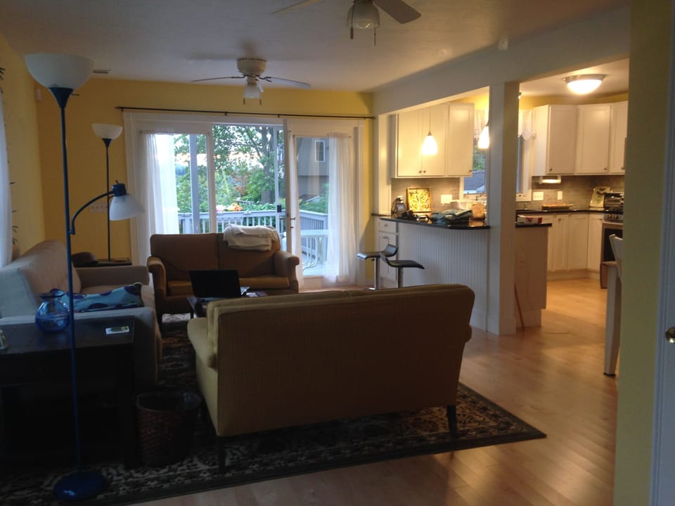 2nd Living room, kitchen and doors to deck