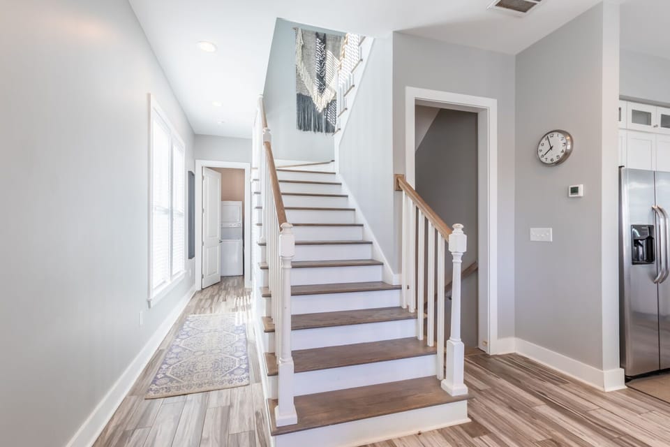 Gorgeous stairway with open lighting.