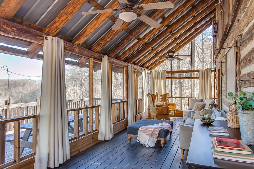 Main Cabin - screened in porch with bed swing