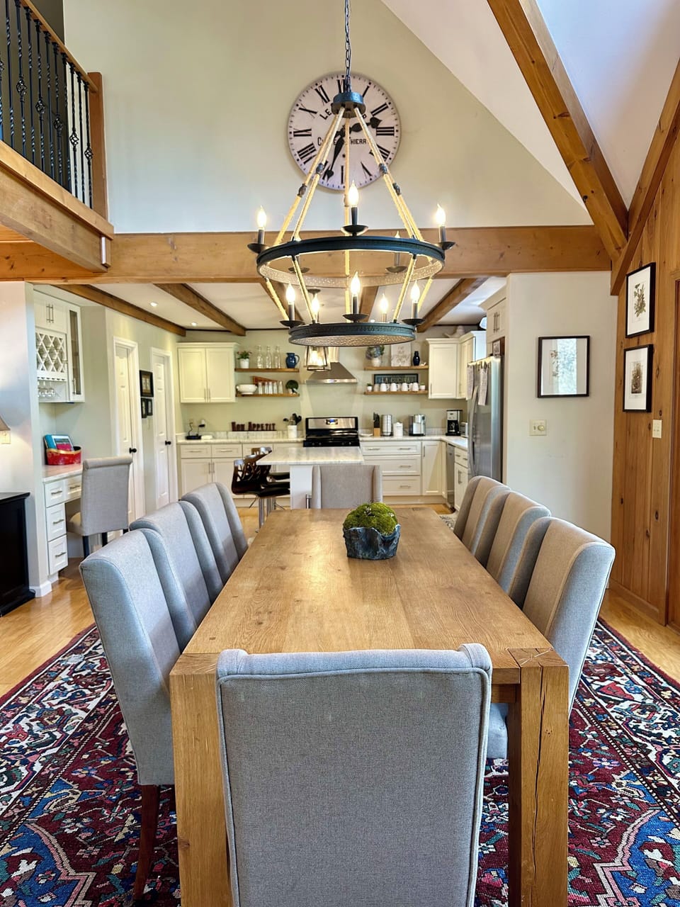 A large Restoration Hardware table seats 8-10 people.  