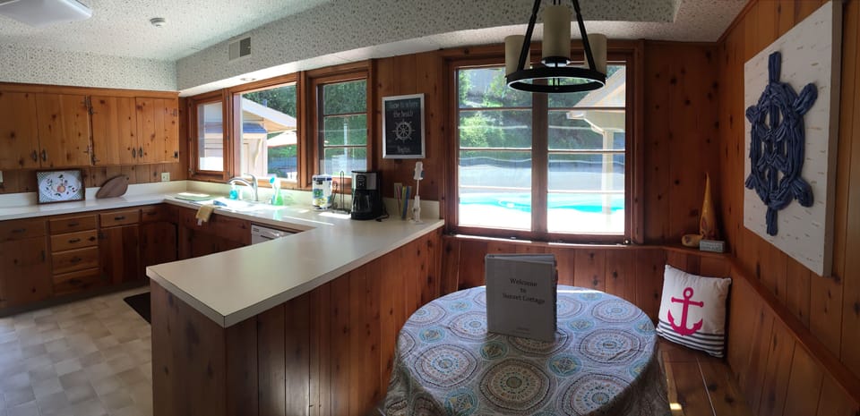 Kitchen with built in banquette.   