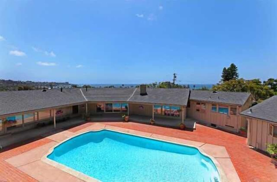 Birdseye view of pool/house overlooking ocean.  