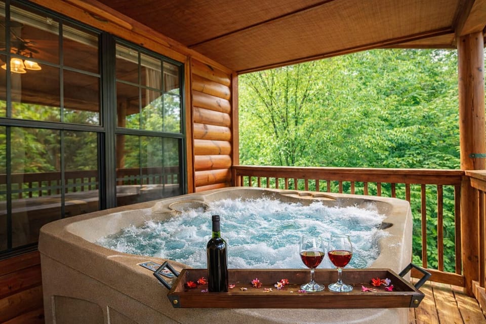 Relax in the bubbling four‑person hot tub and savor a glass of wine as you soak in pure mountain tranquility
