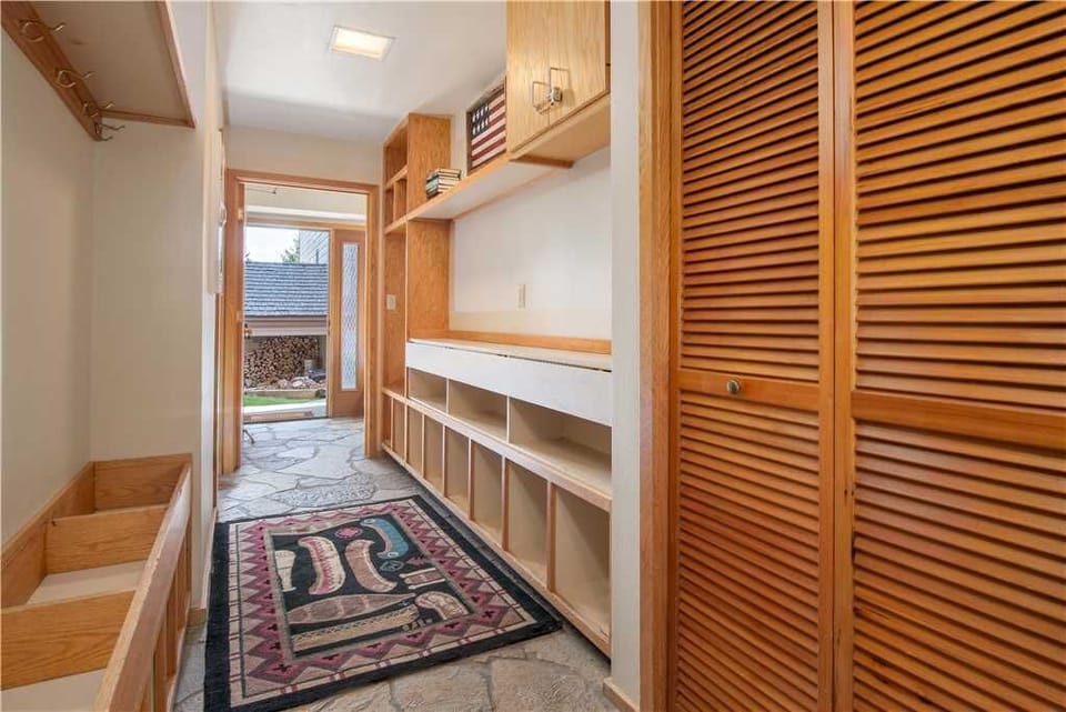 Downstairs Hall with Storage Cubbies & Laundry