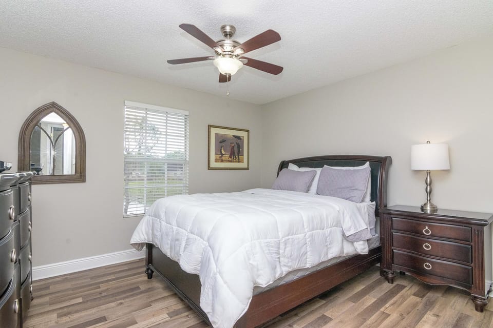 Master Bedroom with King Size Bed and Walk-In Closet