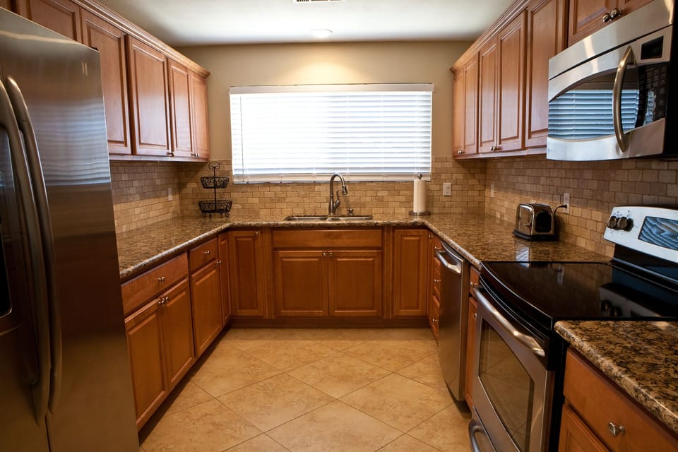 A Beautiful Kitchen Re-Built in 2012 with Granite and Stainless Steel Appliances