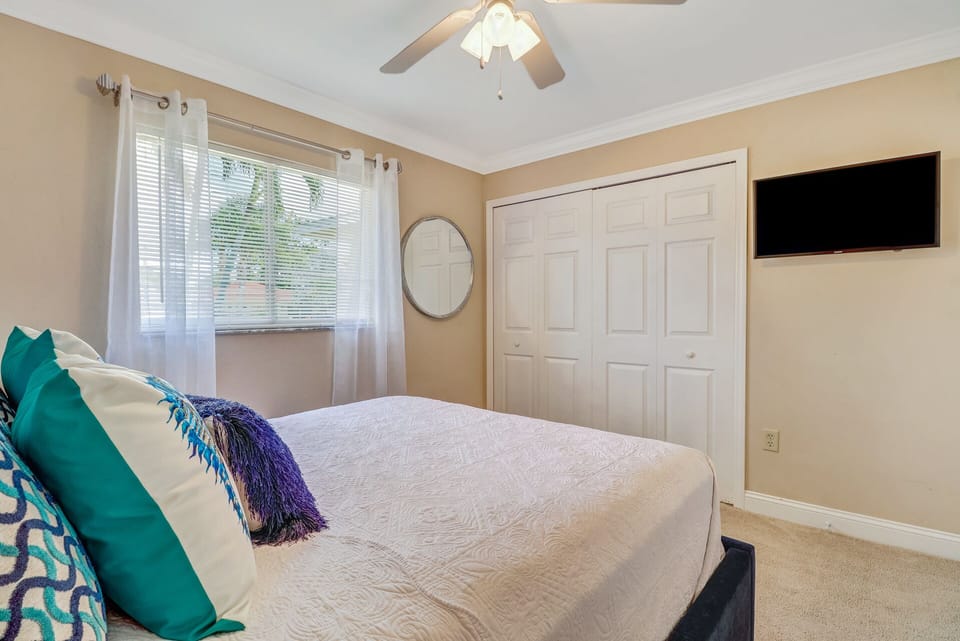 Queen Bed with TV