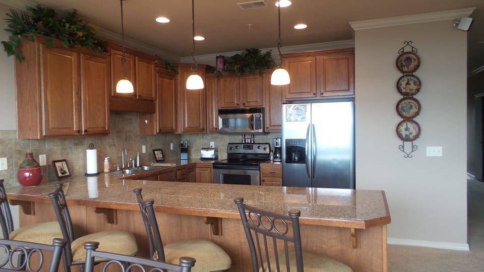 Counter seating for 4 in addition to dining seating for 6.