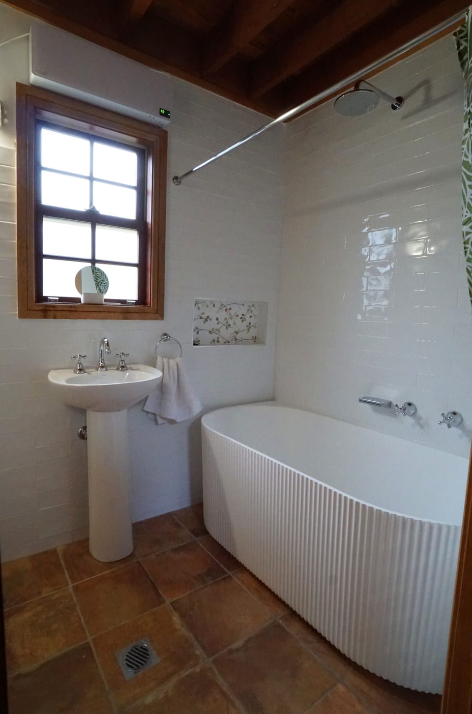 New bathroom with deep fluted bath and shower