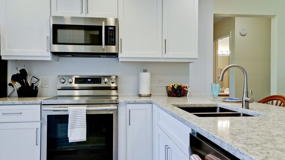 Fully stocked kitchen for cooking at home.