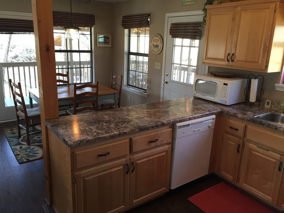 Kitchen and dining area in the Tranquil Chalet.