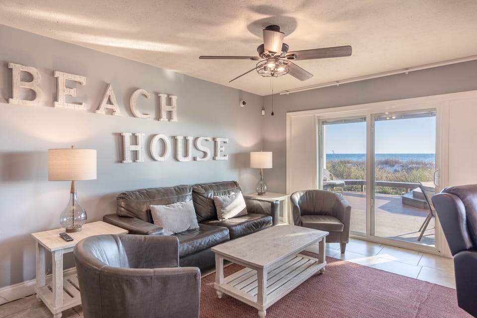 Truly a "Beach House" with a large private beach! New Sliding Glass Door with built in mini blinds for privacy Queen sofa Sleeper 2 Chairs ALL NEW tables and Lamps