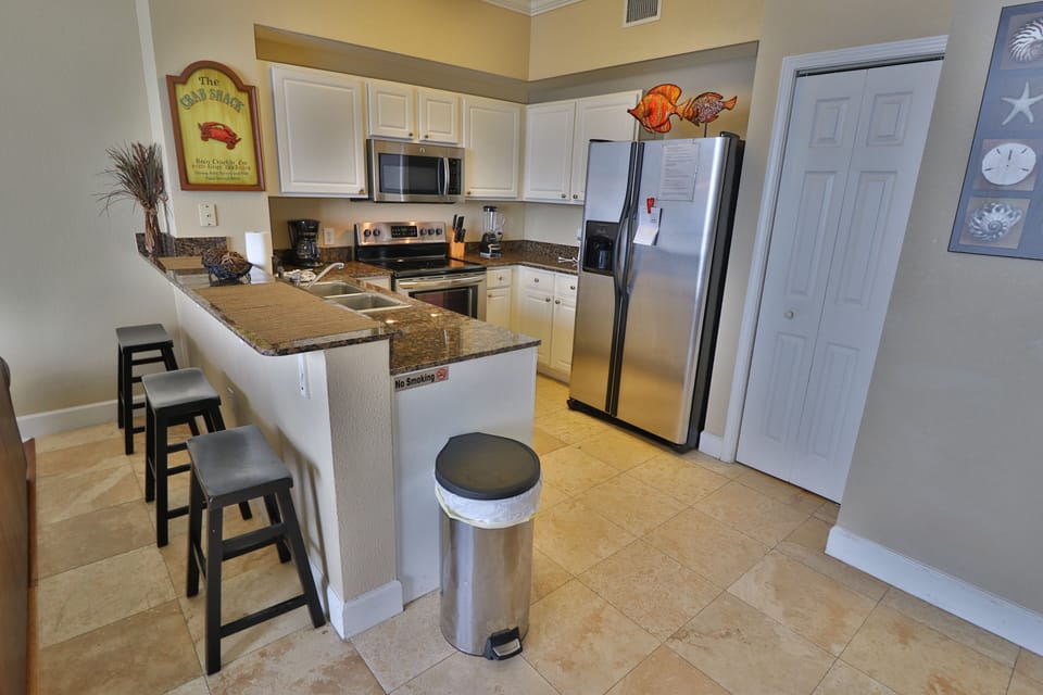 Breakfast Bar & Fully Stocked  Kitchen With New Fridge
