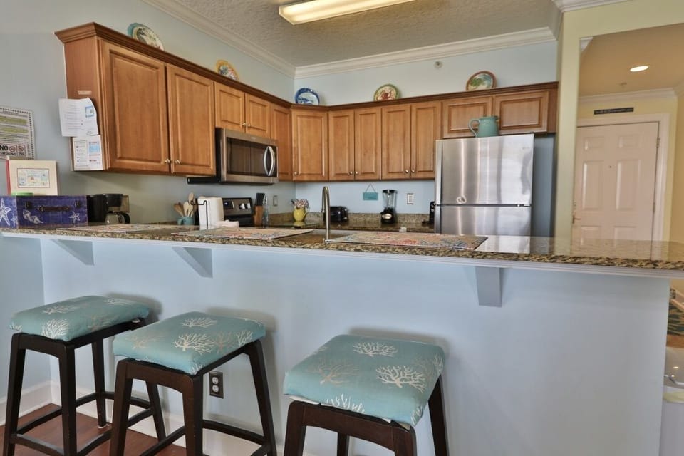 Breakfast bar connecting to kitchen