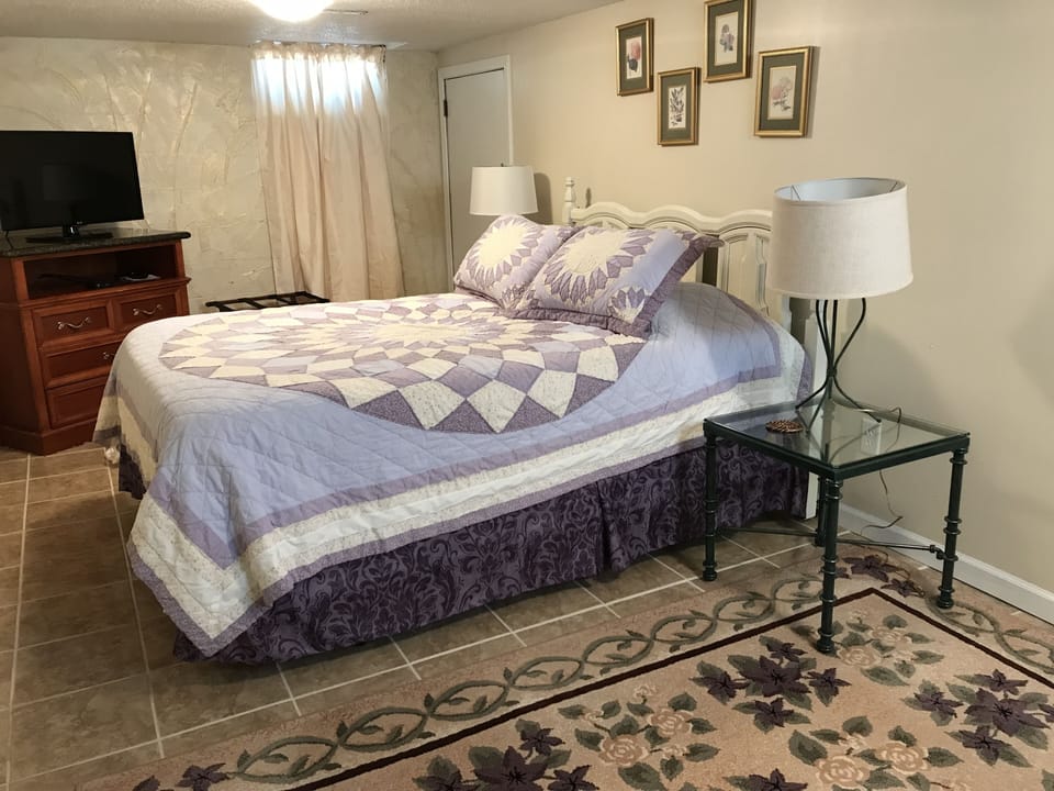 Bedroom 3 with smart TV.